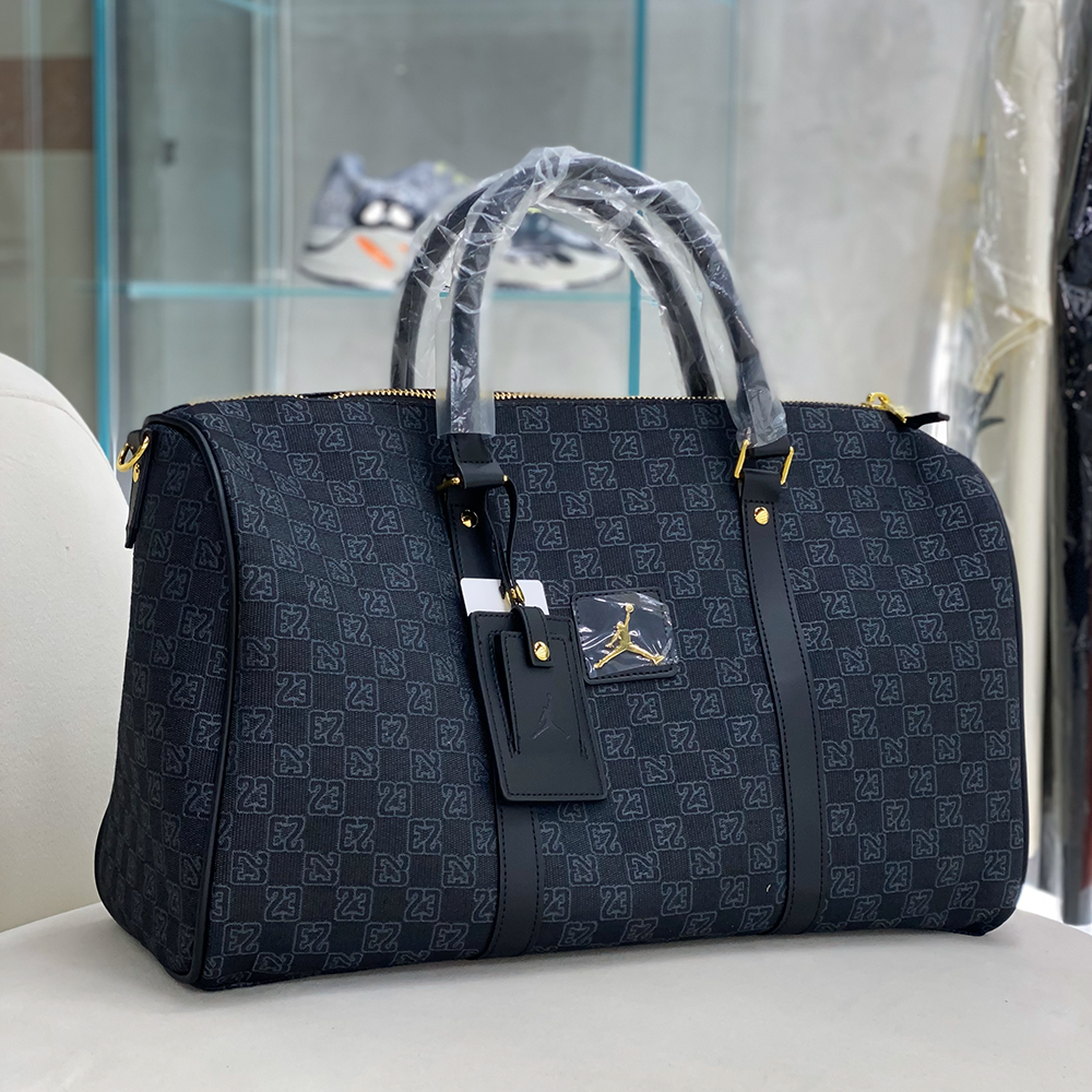 Jordan Monogram "Black/Gold" 25 Liter Duffel Bag
