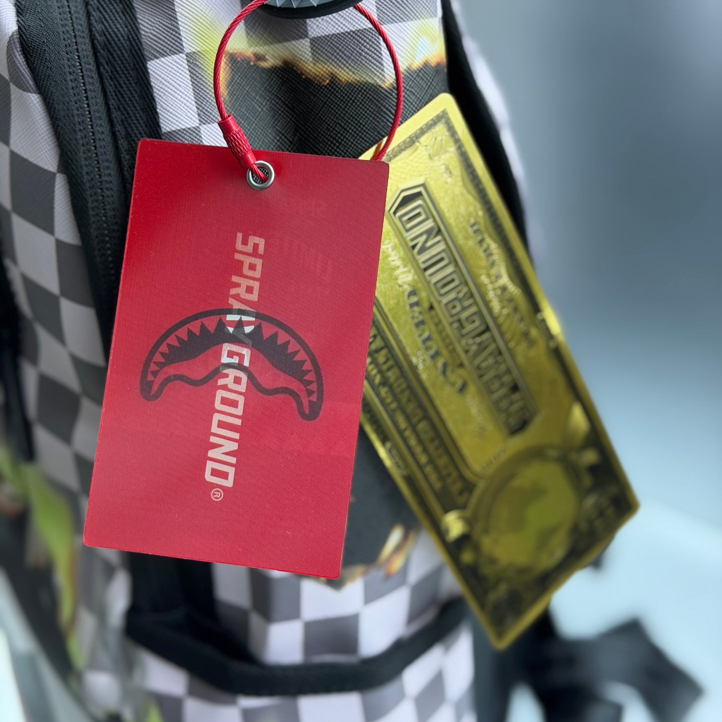 Sprayground Check Melt Backpack